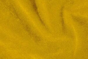 Yellow velvet fabric texture used as background. violet fabric background of soft and smooth textile material. There is space for text. photo