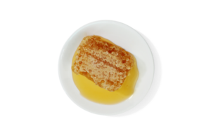 beeswax honeycomb yellow natural honey slices on white plate isolated PNG transparent