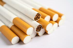 Cigarette, tobacco in roll paper with filter tube, No smoking concept. photo