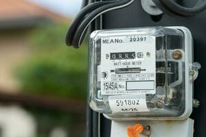 Bangkok, Thailand June 20, 2022,Electric measuring power meter for energy cost at home and office. photo