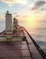 General cargo ship argosy in ocean photo