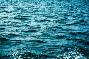 Blue sea wave ripple surface photo