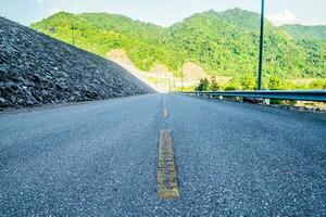 Road way sign country on dam mountain photo