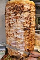 rotating traditional gyros meat close up photo