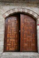 a brown wood old door in turkey photo