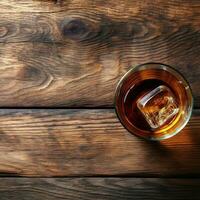 Whiskey Bourbon in a Glass with Ice on a wooden background with copyspace. Generative AI photo