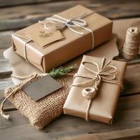 The gifts on the table are wrapped in kraft paper tied with jute. Blurred background. photo