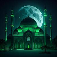 Photo a large mosque with a green light in the dark