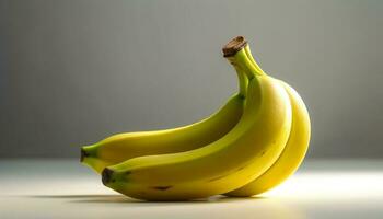 maduro banana, un sano bocadillo para vegetariano dietas, en verde antecedentes generado por ai foto