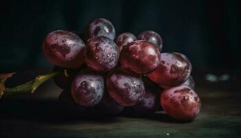 Juicy grape bunches on rustic wood table, a healthy snack generated by AI photo