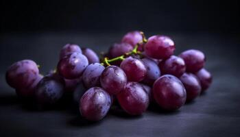 Juicy purple grapes on a wet branch, a refreshing snack generated by AI photo