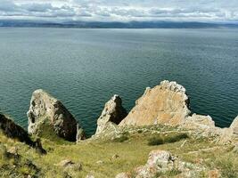 Rock Three Brothers, Cape Sagan-Khushun on Olkhon Island. Baikal, Russia photo