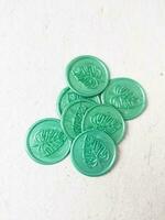 colorful wax coin made from wax sealing stamp for vintage look for letter or wedding invitation photo