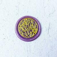 colorful wax coin made from wax sealing stamp for vintage look for letter or wedding invitation photo