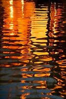Water ripples reflected in the water at night. photo