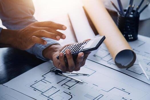 Construction and structure concept of Engineer or architect meeting for project working with partner and engineering tools on model building and blueprint in working site, contract for both companies. photo