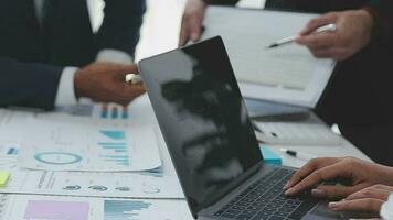 Close up of Business team analyzing income charts and graphs with modern laptop computer. Business analysis and strategy concept. video