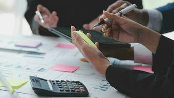 Close up of Business team analyzing income charts and graphs with modern laptop computer. Business analysis and strategy concept. video