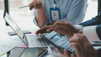 Close up of Business team analyzing income charts and graphs with modern laptop computer. Business analysis and strategy concept. video