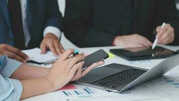 Close up of Business team analyzing income charts and graphs with modern laptop computer. Business analysis and strategy concept. video