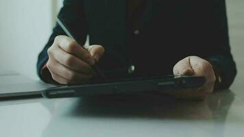 Shot of a asian young business Female working on laptop in her workstation. video