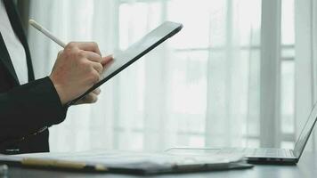 Shot of a asian young business Female working on laptop in her workstation. video