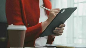 Shot of a asian young business Female working on laptop in her workstation. video