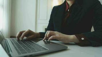 Shot of a asian young business Female working on laptop in her workstation. video