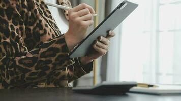 Shot of a asian young business Female working on laptop in her workstation. video