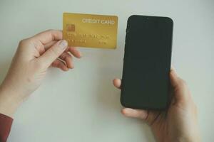 Concept online payment with cradit card. Hand of men using laptop for to payment make online health insurance. photo