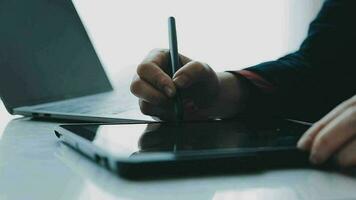 Portrait of Asian young female working on laptop at office video