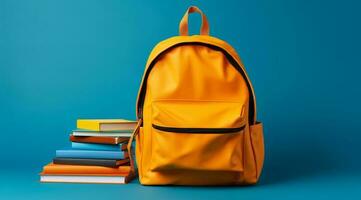 Backpack filled with school supplies. Back to school concept. photo