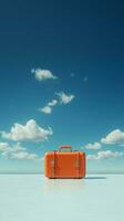 Orange suitcase in the sky Travel and vacation concept photo