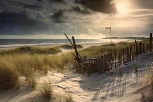 A photograph of a deserted beach with an old broken fence running along the dunes in the foreground and clusters of sea oats. AI generative photo