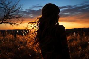 Silhoutte of girl looking into space on a field. AI generative photo