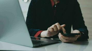 Portrait of Asian young female working on laptop at office video