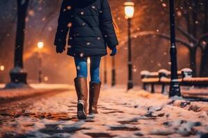 Back view of close up of a woman leg walking in snowy winter night park. AI generative photo