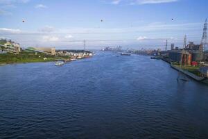 Aerial view of the river and industrial area with blue sky in Narayanganj-Bangladesh photo