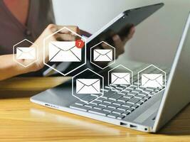 Business idea Email or digital newsletters to customers Sending and receiving emails online. photo