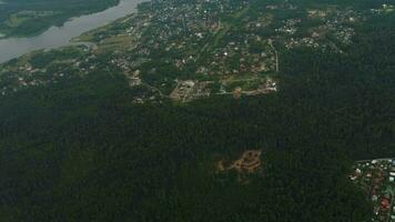 Passenger airplane descending for landing. POV view of the city, forests and rivers video