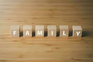Wooden blocks of family icon. family life concept. photo