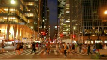 Crowds of people commuting in the city crossing street in rush hour traffic video