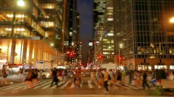 Crowds of people commuting in the city crossing street in rush hour traffic video