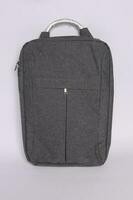 gray color trveling bag front view photo