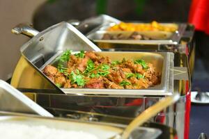 catering buffet food indoor in luxury restaurant with meat and vegetables photo