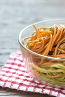 Bowl of colorful spaghetti photo