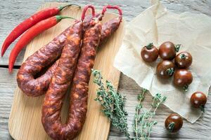 Chorizo with cherry tomatoes photo