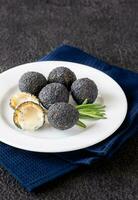 Black truffle mozzarella balls photo