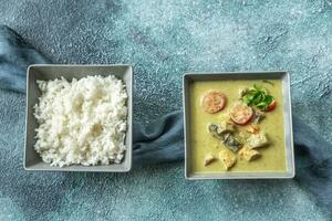 Thai green chicken curry with rice photo