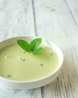 Portion of pea cream soup photo